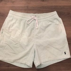 Green seersucker polo swim trunks with pockets